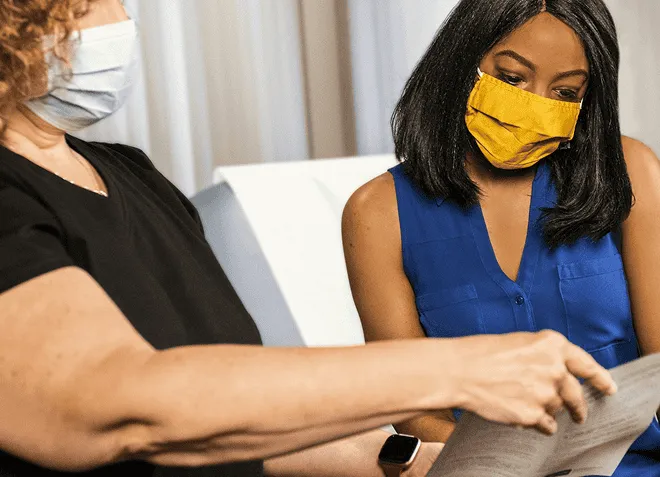 Two women discussing